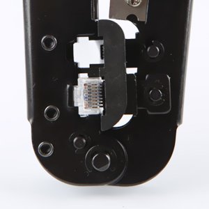 Put the wired crystal RJ45 end into the cable clamp for crimping.